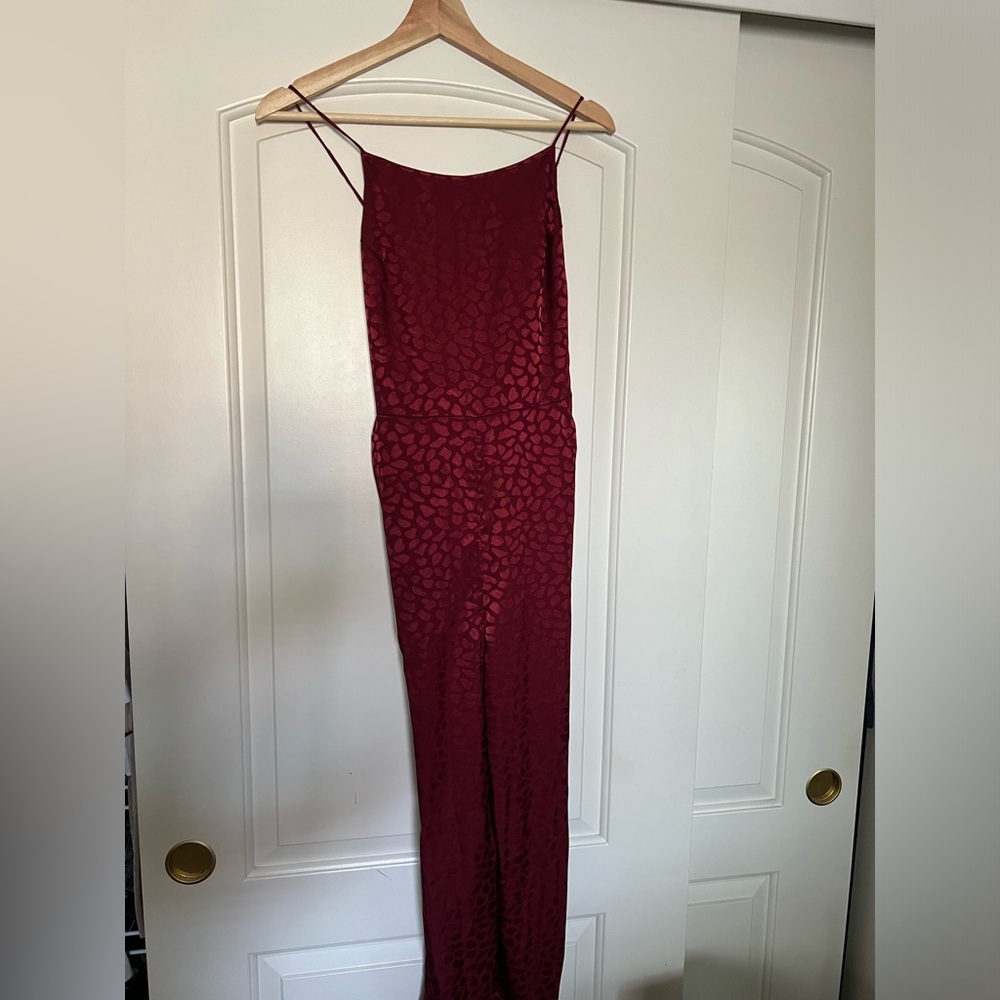 Red printed jumpsuit from Urban Outfitters Size 4.